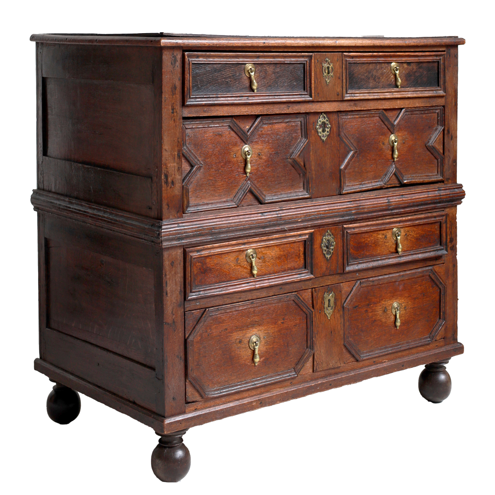 Wooden dresser with multiple drawers and decorative elements on a white background