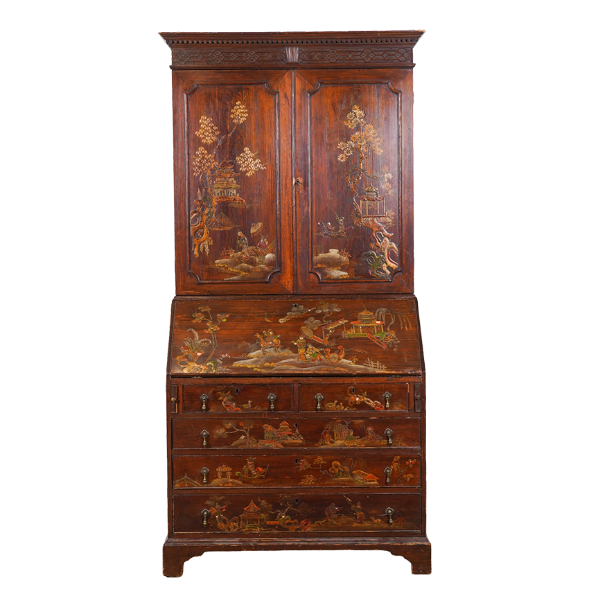 Decorative wooden cabinet with intricate carvings on a white background