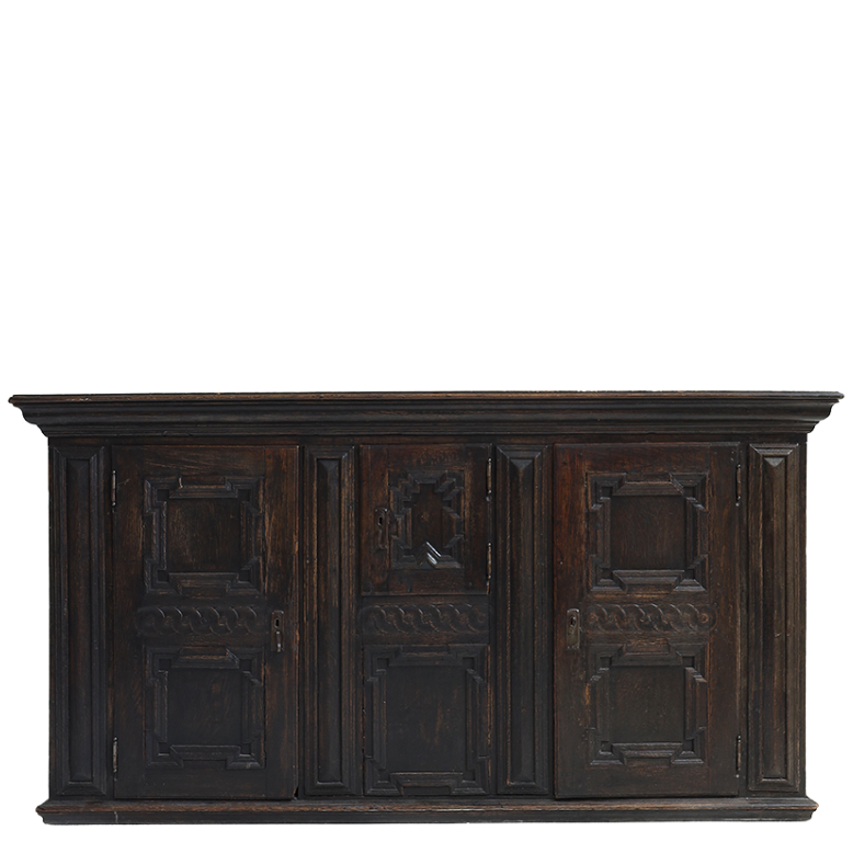 Dark wooden cabinet with decorative panels on a white background