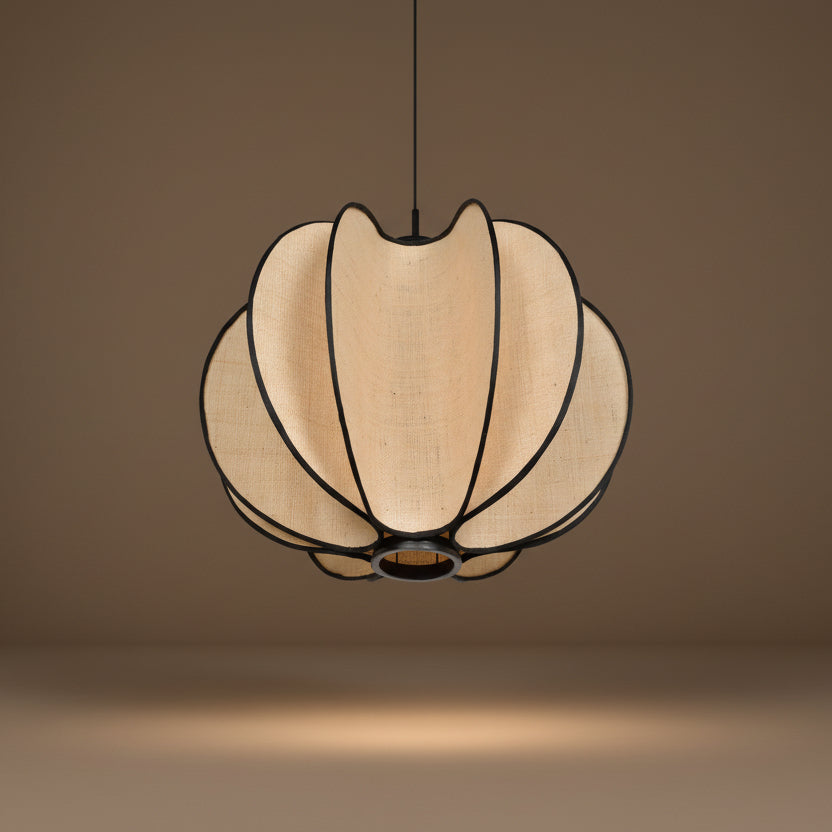 Decorative pendant light with a beige lampshade on a white background