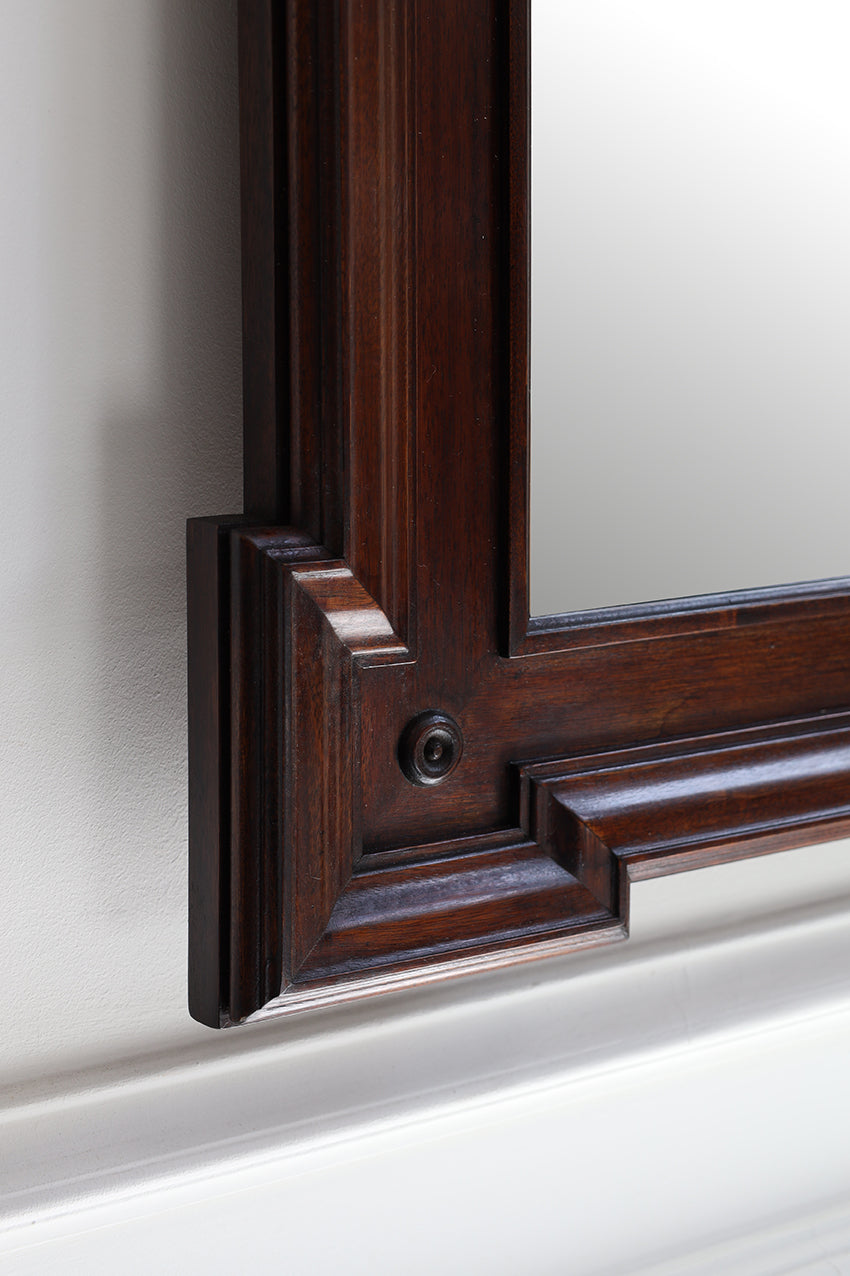 Close-up of a wooden window frame with a white background