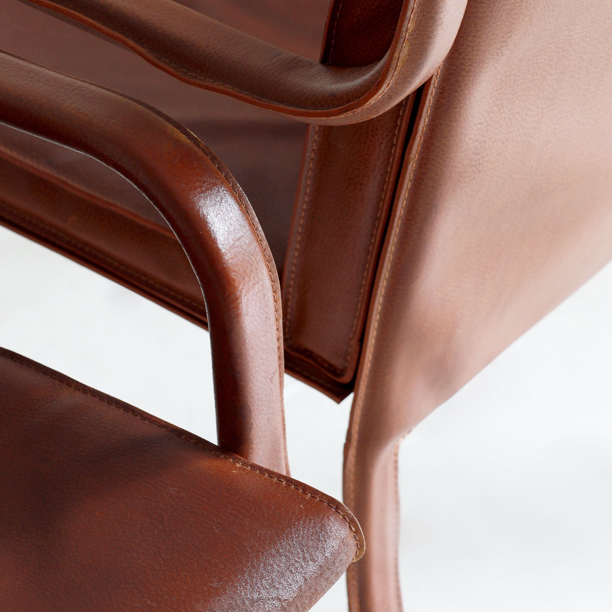 Pair of Mid-Century Quinet Leather Armchairs