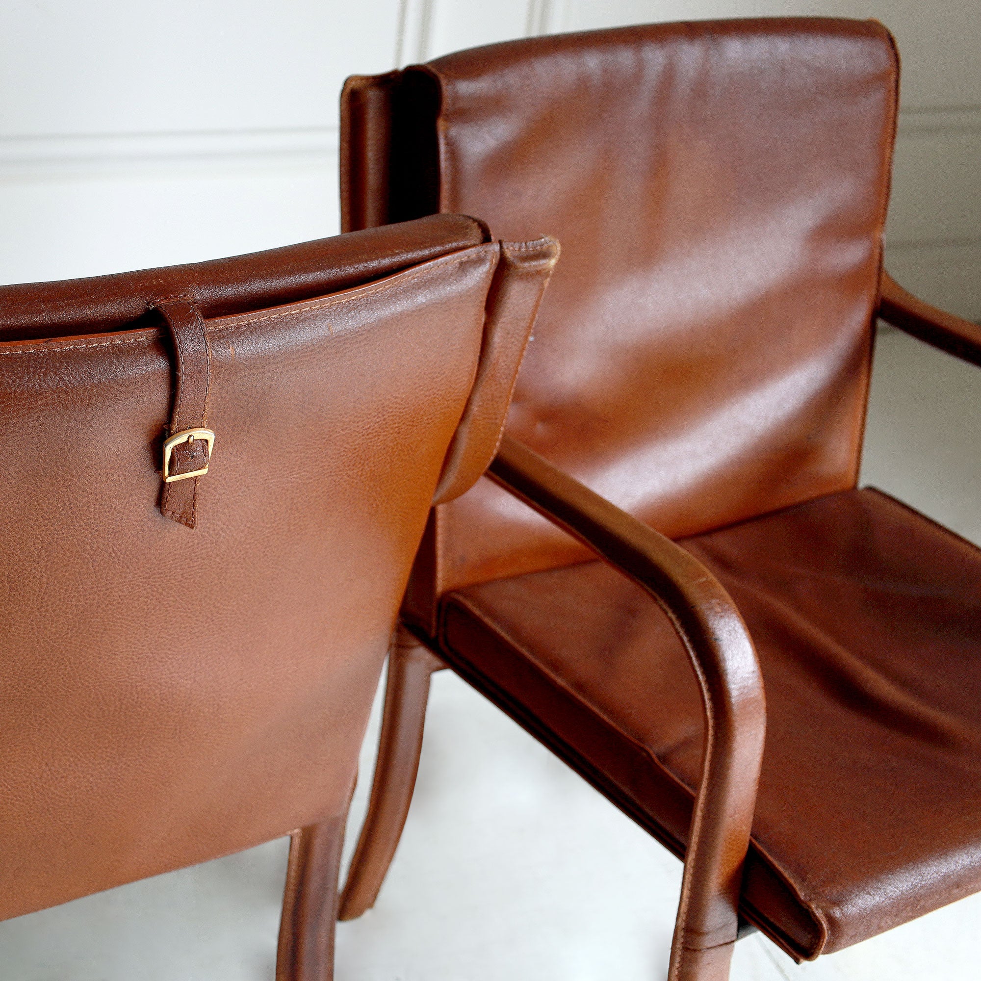 Pair of Mid-Century Quinet Leather Armchairs