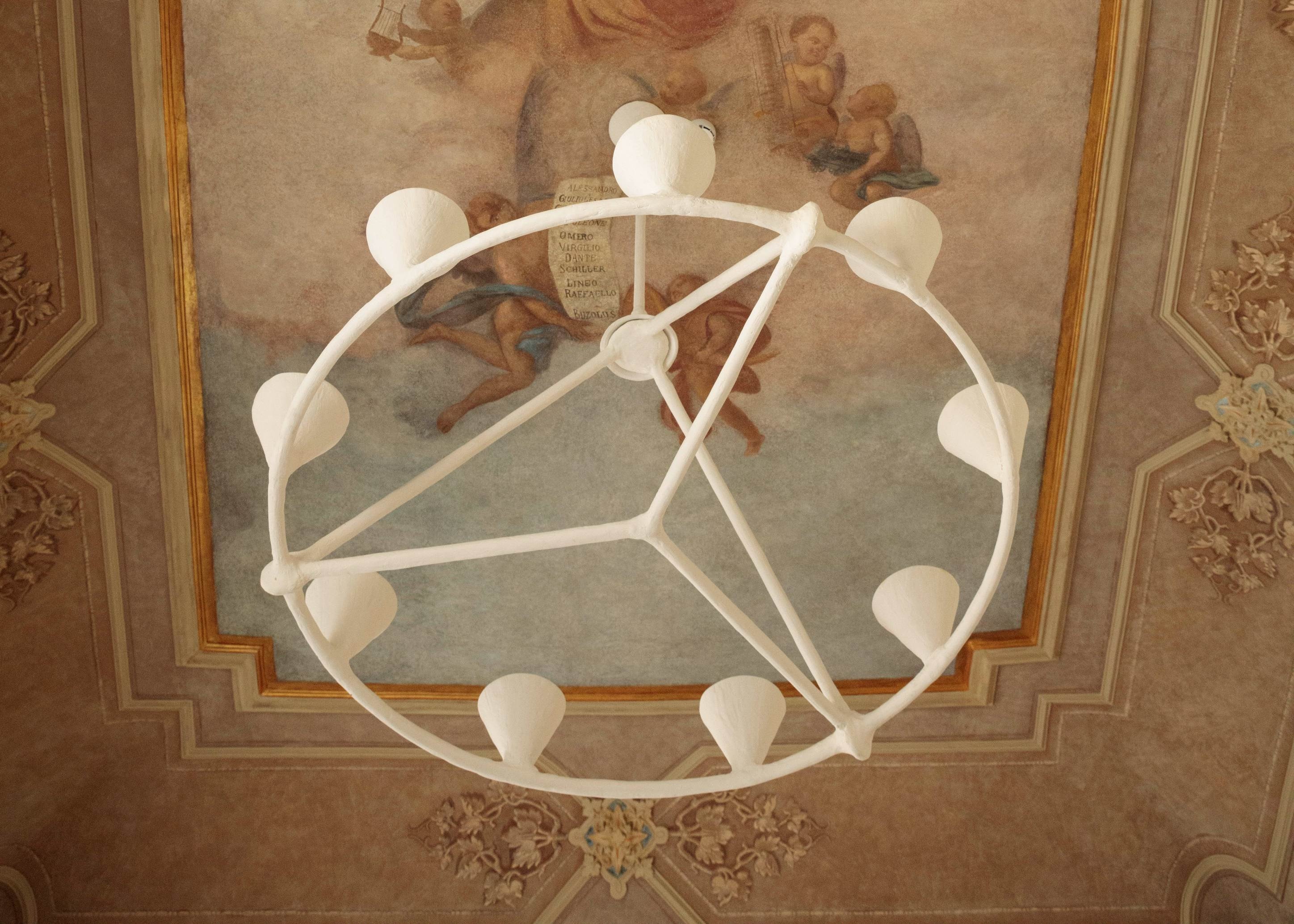 Ceiling with decorative fresco and chandelier