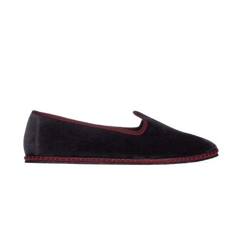 Black slipper with red interior on a white background