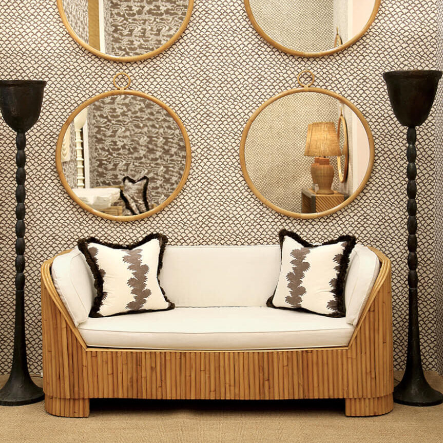 Vignette.M&OJan19.Roche.Kuta Mirror.Palmyra.Cushion.Flores Bamboo Sofa.Endless Standing Lamp WS