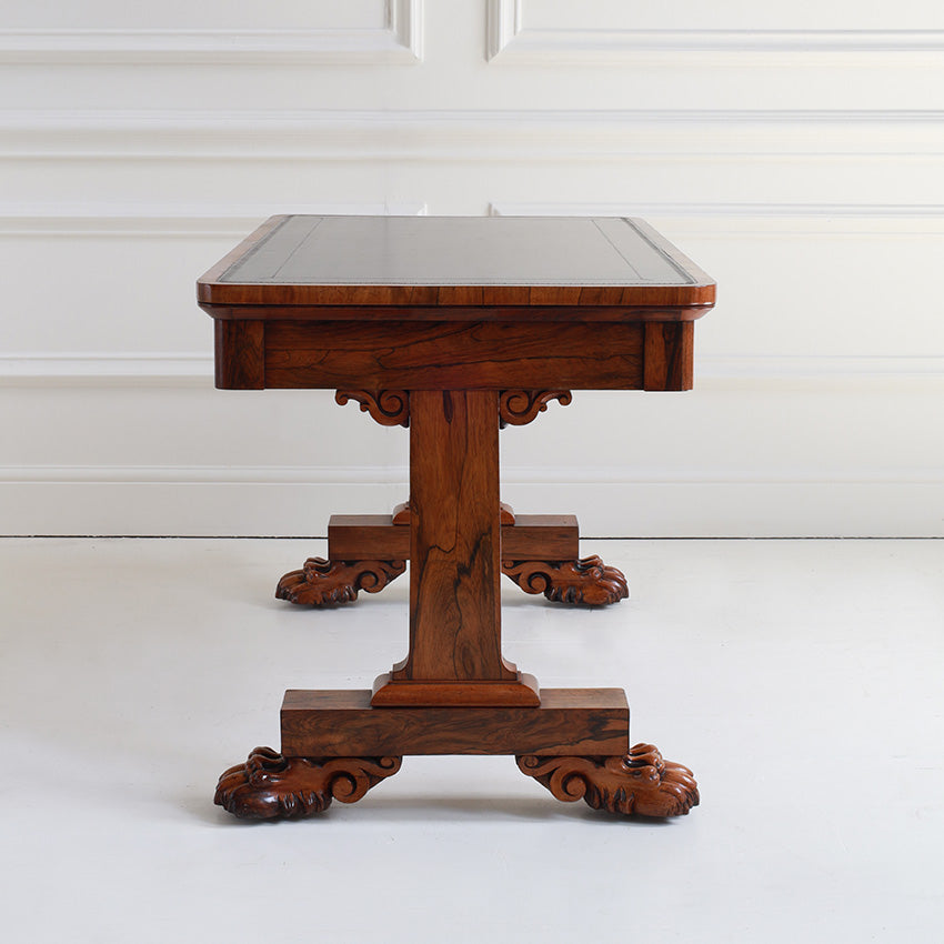 Wooden table with decorative legs on a white background
