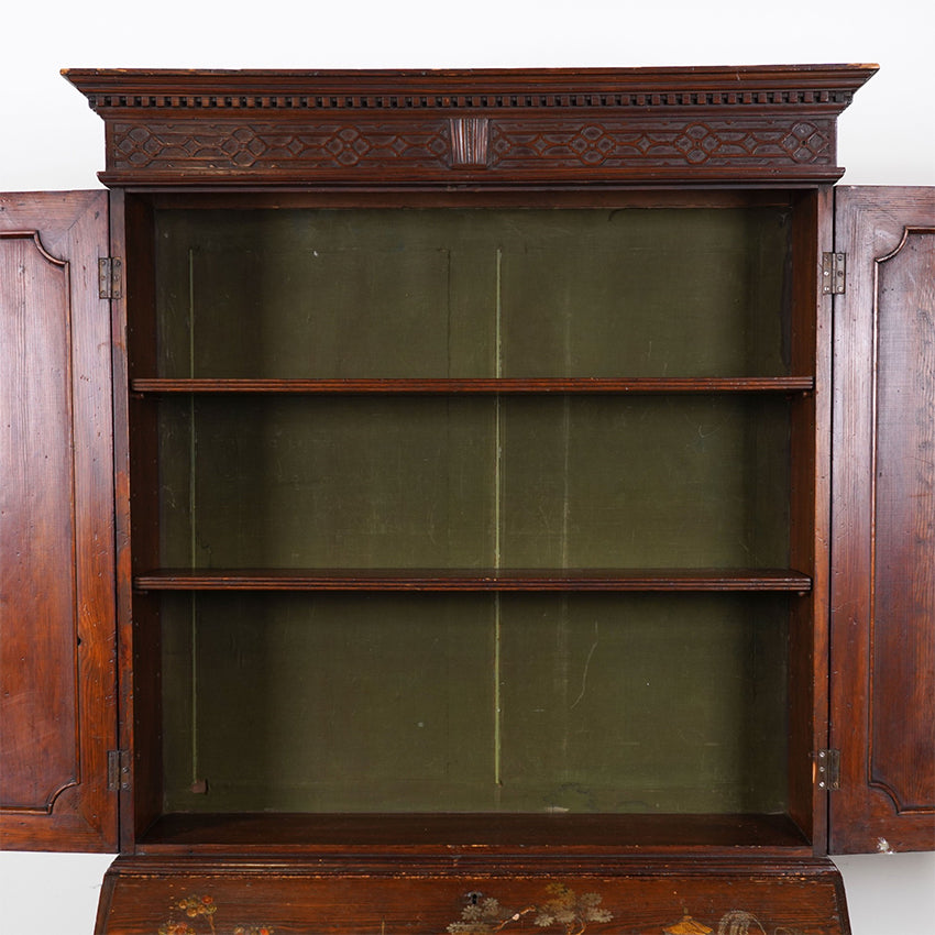 Wooden cabinet with open doors on a white background