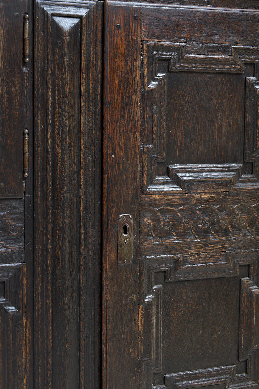 Close-up of an ornate wooden door with intricate carvings