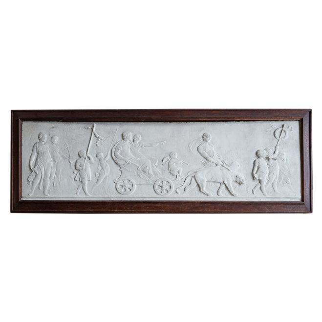 Decorative wall art with embossed figures and a wooden frame on a white background