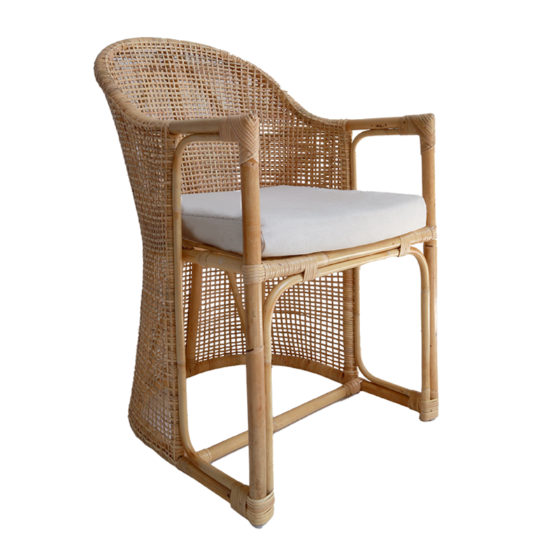 Wicker chair with a white cushion on a white background