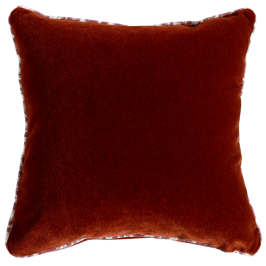 Brown pillow with a textured border on a white background
