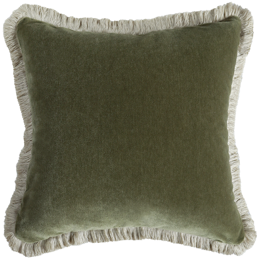 Green velvet pillow with frayed edges on a white background