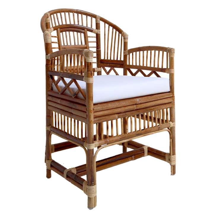 Wicker chair with a white cushion on a white background