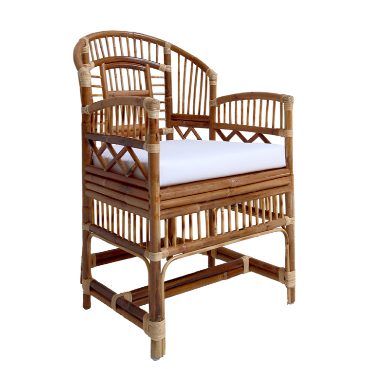Wicker chair with a white cushion on a white background